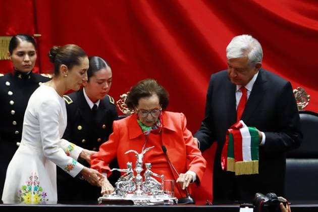 Outgoing President Andres Manuel Lopez Obrador and President of the Chamber of Deputies Ifigenia MartoÂ­nez during the symbolic act of handing over the presidential sash to Claudia Sheinbaum Pardo as the new female president of Mexico during the inauguration ceremony at the Congress of the Union. on October 1, 2024 in Mexico City, Mexico. Mexico City Mexico - ZUMAe321 20241001_zia_e321_030 Copyright: xCarlosxSantiagox