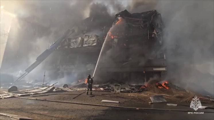 Russia Theatre Fire 8777701 03.10.2024 In this handout video grab released by the Russian Emergencies Ministry, firefighters work to extinguish a fire at the Khabarovsk Regional Musical Theater in Khabarovsk, Russia. Russian Emergency Situations Ministry Khabarovsk Russia  Copyright: xx