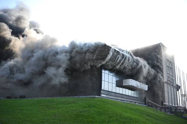 RUSSIA, KHABAROVSK - OCTOBER 3, 2024: Smoke rises over the fire-hit Khabarosvk Territory Music Theatre. Sergei Ivanov TASS  74626239