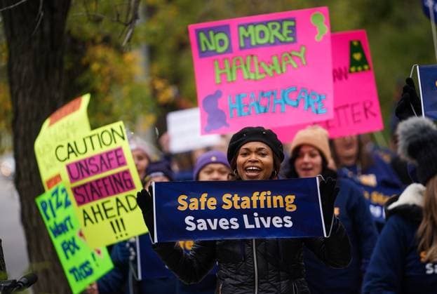 October 3, 2024, Regina, Sk, Canada: People hold signs while marching during a rally organized by Saskatchewan Union of Nurses in Regina, on Thursday, October 3, 2024. Regina Canada  - ZUMAc35_ 20241003_zaf_c35_090 Copyright: xHeywoodxYux