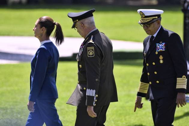 October 3, 2024, Mexico, Mexico, USA: Mexico s President Claudia Sheinbaum (C) flanked by Mexico s Defense Minister Ricardo Trevilla Trejo (L) and Secretary of the Navy Raymundo Pedro Morales Angeles (R) during the military inauguration ceremony of Claudia Sheinbaum as Supreme Commander-in-Chief of the Mexican Armed Forces, at the Campo Marte Military Camp, in Mexico City, Mexico on October 03, 2024. PRESIDENCIA POOL PI Mexico USA - ZUMAp124 20241003_zaa_p124_040 Copyright: xPresidenciax