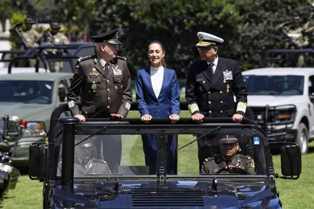 October 3, 2024, Mexico, Mexico, USA: Mexico s President Claudia Sheinbaum (C) flanked by Mexico s Defense Minister Ricardo Trevilla Trejo (L) and Secretary of the Navy Raymundo Pedro Morales Angeles (R) during the military inauguration ceremony of Claudia Sheinbaum as Supreme Commander-in-Chief of the Mexican Armed Forces, at the Campo Marte Military Camp, in Mexico City, Mexico on October 03, 2024. PRESIDENCIA POOL PI Mexico USA - ZUMAp124 20241003_zaa_p124_041 Copyright: xPresidenciax
