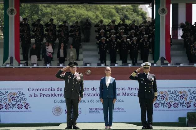 October 3, 2024, Mexico, Mexico, USA: Mexico s President Claudia Sheinbaum (C) flanked by Mexico s Defense Minister Ricardo Trevilla Trejo (L) and Secretary of the Navy Raymundo Pedro Morales Angeles (R) during the military inauguration ceremony of Claudia Sheinbaum as Supreme Commander-in-Chief of the Mexican Armed Forces, at the Campo Marte Military Camp, in Mexico City, Mexico on October 03, 2024. PRESIDENCIA POOL PI Mexico USA - ZUMAp124 20241003_zaa_p124_052 Copyright: xPresidenciax