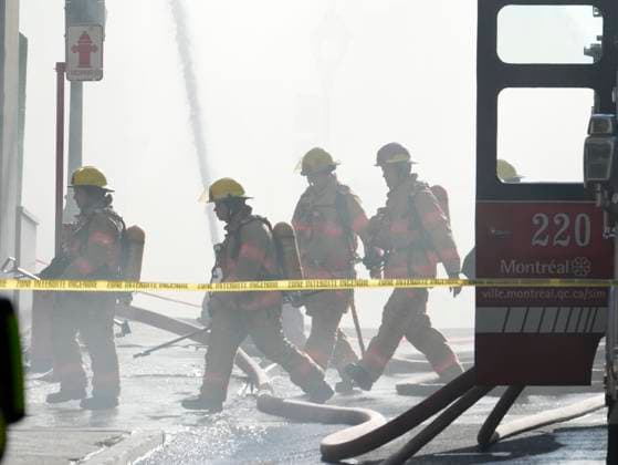 October 4, 2024, Montreal, Pq, CANADA: Firefighters battle a fire in Old Montreal on Friday, Oct.4, 2024. Montreal police are investigating a major fire that broke out early this morning in a century-old building in Old Montreal, leaving at least one person in hospital. Montreal CANADA  - ZUMAc35_ 20241004_zaf_c35_031 Copyright: xRyanxRemiorzx