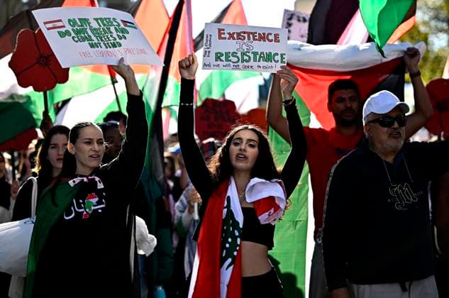 October 5, 2024, Ottawa, On, CAN: Pro-Palestine demonstrators chant as they march in downtown Ottawa, on Saturday, Oct. 5, 2024. Ottawa CAN  - ZUMAc35_ 20241005_zaf_c35_128 Copyright: xJustinxTangx