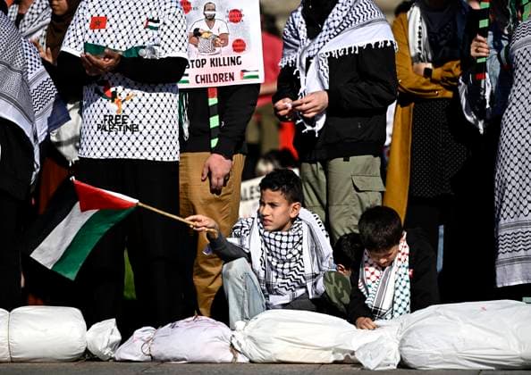 October 5, 2024, Ottawa, On, CAN: A youngster waves the flag of Palestine as pro-Palestine demonstrators rally on Parliament Hill in Ottawa, on Saturday, Oct. 5, 2024. Ottawa CAN  - ZUMAc35_ 20241005_zaf_c35_130 Copyright: xJustinxTangx
