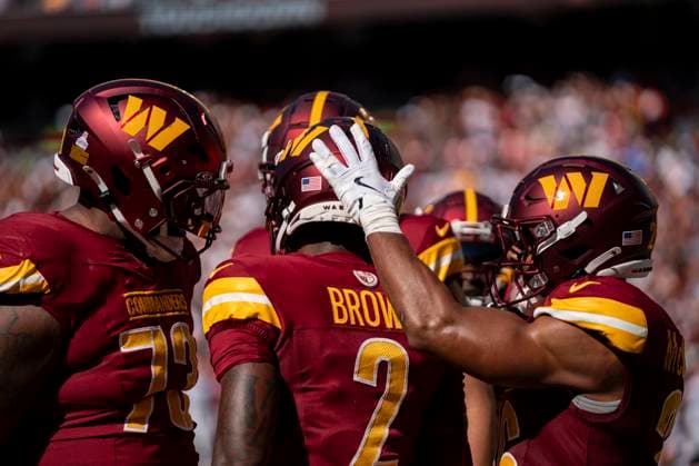 Washington Commanders wide receiver Dyami Brown (2) celebrates after a scoring a touchdown during a game against the Cleveland Browns at Northwest Stadium in Landover, Maryland on Sunday, October 6, 2024. The Commanders defeated the Browns 34-14.  WAP20241006490 BONNIExCASH