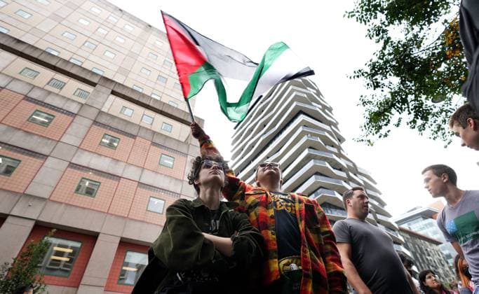 October 7, 2024, Montreal, Pq, CANADA: Attendees wave a Palestinian flag during a pro-Palestinian demonstration on the anniversary of a Hamas attack on Israel that triggered the ongoing war in Gaza in front of Concordia University, in Montreal, Monday, Oct. 7, 2024. Montreal CANADA  - ZUMAc35_ 20241007_zaf_c35_023 Copyright: xChristinnexMuschix