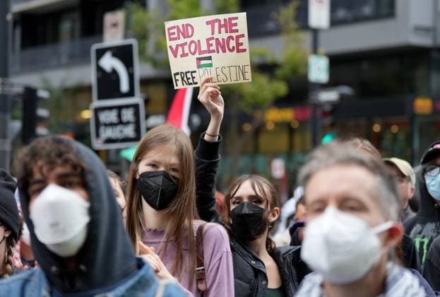 October 7, 2024, Montreal, Pq, CANADA: An attendee holds up a sign of support during a pro-Palestinian demonstration on the anniversary of a Hamas attack on Israel that triggered the ongoing war in Gaza in front of Concordia University, in Montreal, Monday, Oct. 7, 2024. Montreal CANADA  - ZUMAc35_ 20241007_zaf_c35_024 Copyright: xChristinnexMuschix