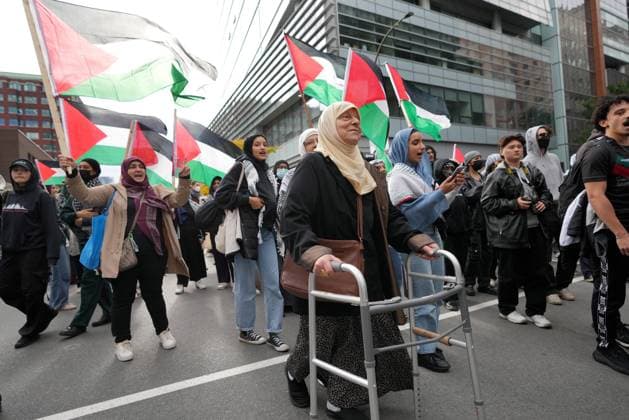 October 7, 2024, Montreal, Pq, CANADA: Attendees march during a pro-Palestinian demonstration on the anniversary of a Hamas attack on Israel that triggered the ongoing war in Gaza, in Montreal, Monday, Oct. 7, 2024. Montreal CANADA  - ZUMAc35_ 20241007_zaf_c35_045 Copyright: xChristinnexMuschix