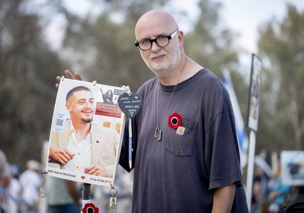 Michael Marlowe pictured at the memorial. He lost his son Jake at the Nova Music festival October 7th anniversary memorial to mark the terror attacks by Hamas militants at the Nova Music festival in Kibbutz Reim, Israel...Families of the murdered gather in emotional scenes to pay their respect on the anniversary. . .Michael Marlowe pictured at the memorial. He lost his son Jake at the Nova Music festival a year ago. 07.10.2024  Copyright: xDanxCharityx NINTCHDBPICT000938962091