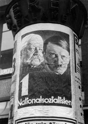 Orig. caption... BERLIN IM ZEICHENNDES WAHLKAMPFES. U.B.z. ein Wahlplakat der Nationalsozialistischen Deutschen Arbeiter-Partei mit den Köpfen des Reichspräsidenten und des Reichkanzlers. 27.2.33 Note Posters Faces CD685 persons: PAUL VON HINDENBURG*;ADOLF HITLER* sites: BERLIN;GERMANY sp_sw x5600x  Copyright: xx ELECTION POSTER 1933
