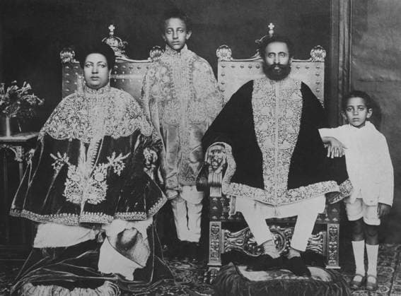 Orig. caption... EMPEROR FLEES TO JIBUTI. The Emperor of Abyssinia, accompanied, it is believed by the Empress and the Crown Prince, left the capital today for Jibuti, in French Somaliland. O.P.S. The emperor and empress of Abyssinia with their two sons. Note Ras Tafari,1892-1975, took after the coronation the name Haile Sellassie I. Emperor of Ethiopia 1930-1974 Thrones Cushions Embroideries Shorts Cloaks CD486 persons: MAKONNEN, PRINCE OF ETHIOPIA;MENEN ASFAW, EMPRESS OF ETHIOPIA;HAILE SELLASSIE I, EMPEROR OF ETHIOPIA sites : AFRICA; ETHIOPIA sp_sw x5600x *** Orig caption EMPEROR FLEES TO JIBUTI The Emperor of Abyssinia, accompanied, it is believed by the Empress and the Crown Prince, left the capital today for Jibuti, in French Somalil  Copyright: xx THE EMPEROR OF ABYSSINIA WITH FAMILY