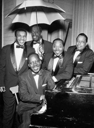 MALMÖ 1956-06. Orig. caption...SINGING UNDER THE UMBRELLA invited the Golden-Gate Quartet to Malmö Folkets Park where their song soon enough made the spectators forget about a cloudy sky and the drizzle. The black-skinned boys were successful with, among other things, Oloman river and the Swedish song Per Olsson s farm. Note Tuxedos Umbrellas Smiles Gospel CD451 persons: THE GOLDEN GATE QUARTET sites: USA*; SWEDEN; MALMÖ Malmö Sweden sp_sw x5600x *** MALMÖ 1956 06 Orig caption SINGING UNDER THE UMBRELLA invited the Golden Gate Quartet to Malmö Folkets Park where their song soon enough made the spectators forget about a cloudy sky and the drizzle The black skinned boys were successful with, among other things, Oloman river and the Swed  Copyright: xx THE GOLDEN-GATE QUARTET