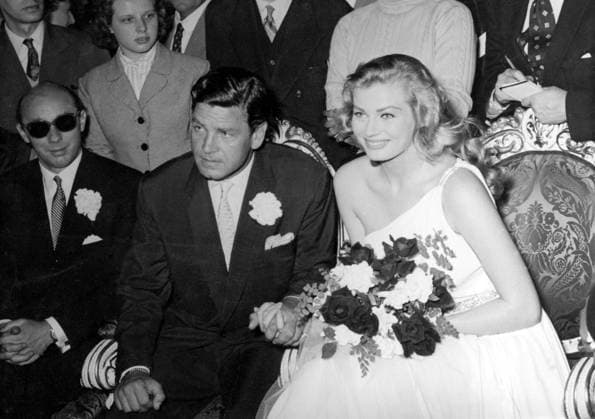 Orig. caption... THE SECOND BEST WEDDING Milan, 23rd. The wedding of Miss Iceberg Anita Ekberg, the world-famous Swedish-born film star and of the British actor Anthony Steel took place yesterday in Florence at 4.50 p.m. Best man for the bridegroom was Mr. Donald Zec, a Mirror executive, for the bride Mr. Ewen Lloyd, the well-known film producer. Note Actor Bouquets Bride and Groom CD129 persons: Anita Ekberg ;Anthony Steel sites: ITALY ;UK* ;FLORENCE ;SWEDER* sp_sw x5600x *** Orig caption THE SECOND BEST WEDDING Milan, 23rd The wedding of Miss Iceberg Anita Ekberg, the world famous Swedish born film star and of the British actor Anthony Steel took place yesterday in Florence at 4 50 p m Best man for the bridegroom was Mr Donald Zec, a Mi  Copyright: xXxXxXx ANITA EKBERG GETTING MARRIED