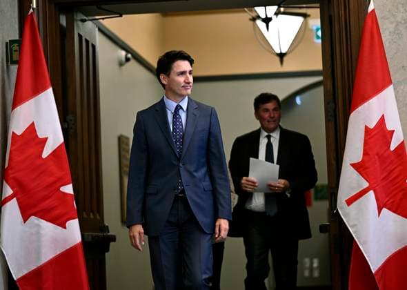 October 14, 2024, Ottawa, On, CAN: Prime Minister Justin Trudeau, Minister of Public Safety, Democratic Institutions and Intergovernmental Affairs Dominic LeBlanc, right, and Minister of Foreign Affairs Melanie Joly, obscured, make their way to a news conference on the investigative efforts related to violent criminal activity occurring in Canada with connections to India, on Parliament Hill in Ottawa, on Monday, Oct. 14, 2024. Ottawa CAN  - ZUMAc35_ 20241014_zaf_c35_041 Copyright: xJustinxTangx