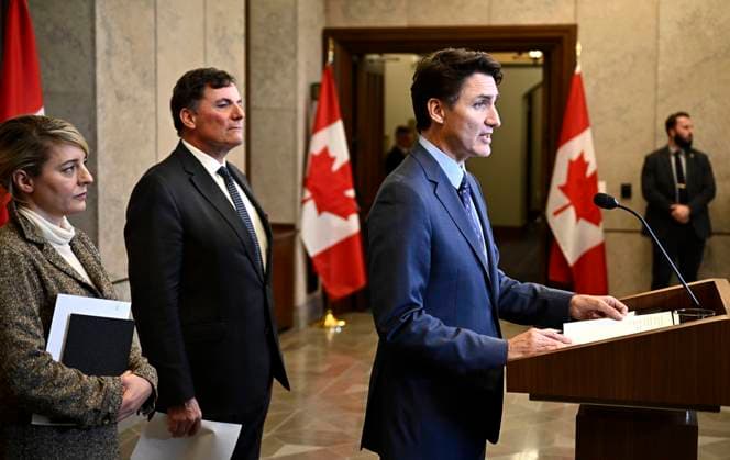 October 14, 2024, Ottawa, On, CAN: Prime Minister Justin Trudeau, right, Minister of Public Safety, Democratic Institutions and Intergovernmental Affairs Dominic LeBlanc, centre, and Minister of Foreign Affairs Melanie Joly participate in a news conference on the investigative efforts related to violent criminal activity occurring in Canada with connections to India, on Parliament Hill in Ottawa, on Monday, Oct. 14, 2024. Ottawa CAN  - ZUMAc35_ 20241014_zaf_c35_045 Copyright: xJustinxTangx