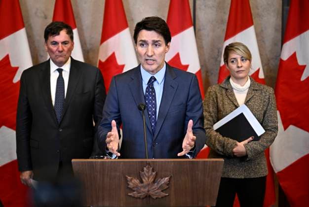 October 14, 2024, Ottawa, On, CAN: Prime Minister Justin Trudeau, Minister of Public Safety, Democratic Institutions and Intergovernmental Affairs Dominic LeBlanc, left, and Minister of Foreign Affairs Melanie Joly, right, participate in a news conference on the investigative efforts related to violent criminal activity occurring in Canada with connections to India, on Parliament Hill in Ottawa, on Monday, Oct. 14, 2024. Ottawa CAN  - ZUMAc35_ 20241014_zaf_c35_049 Copyright: xJustinxTangx