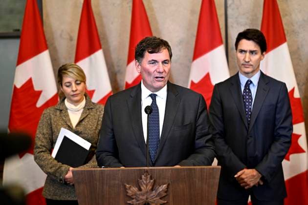 October 14, 2024, Ottawa, On, CAN: Minister of Public Safety, Democratic Institutions and Intergovernmental Affairs Dominic LeBlanc, centre, Prime Minister Justin Trudeau, right, and Minister of Foreign Affairs Melanie Joly participate in a news conference on the investigative efforts related to violent criminal activity occurring in Canada with connections to India, on Parliament Hill in Ottawa, on Monday, Oct. 14, 2024. Ottawa CAN  - ZUMAc35_ 20241014_zaf_c35_051 Copyright: xJustinxTangx