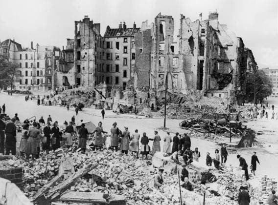 Orig caption BERLINER WORK IN CHAIN GANG Berlin, Germany A long line of Berlin women pass pails of rubble along a chain gang from bombed area to be cleared to a rubble dump at the other end of the line Those who are willing to work, eat well They are paid for the work they do and there is plenty  Copyright: xXxXxXx DRUMMER FRAUEN
