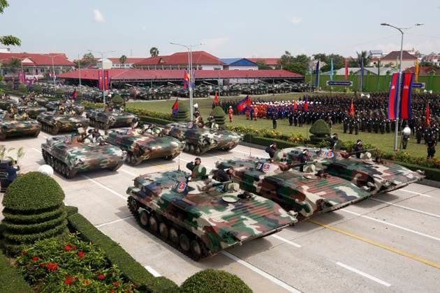 News Bilder des Tages Kambodscha, Militärparade anlässlich der Gründund der RCAF Eliteeinheit Brigade 70 in Phnom Penh (241015) -- PHNOM PENH, Oct. 15, 2024 -- Military vehicles parade during the celebration of the 30th founding anniversary of the Brigade 70 in Phnom Penh, Cambodia on Oct. 15, 2024. The Brigade 70, an elite Royal Cambodian Armed Forces (RCAF) unit, commemorated its 30th founding anniversary on Tuesday, vowing to continue to safeguard the country s peace, security, stability and development. Cambodian Prime Minister Hun Manet presided over the ceremony, during which troops were on parade, displaying military trucks, weapons, armored vehicles, and tanks, among others. (Photo by Xinhua) CAMBODIA-PHNOM PENH-BRIGADE 70-30TH ANNIVERSARY Sovannara