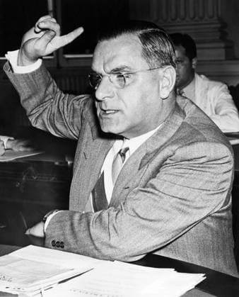 Orig. caption... BUND LEADER NEARLY COMES TO BLOW WITH DIES PROBER Washington, D.C. Fritz Kuhn, leader of the German-American Bund, emphatically voices his views, a few seconds before almost coming to blows with Representative Joe Starnes of Alabama, during his questioning at the Dies Committee hearing on Un-American Activities here, Aug. 16th Starnes rushed at Kuhn when the Fuehrer hurled the word lie! at a question. Capitol policemen came between them to avert blows. Note F Kuhn, 1896-1951, American Nazi. Leader of the German American Bund before World War II, called America s Führer. Interned during the war and in 1945 he was deported to Germany. Facial Expressions Fingering Fingers Anti-American Activities CD61 persons: FRITZ KUHN site  Copyright: xXxXxXx KUHN, FRITZ