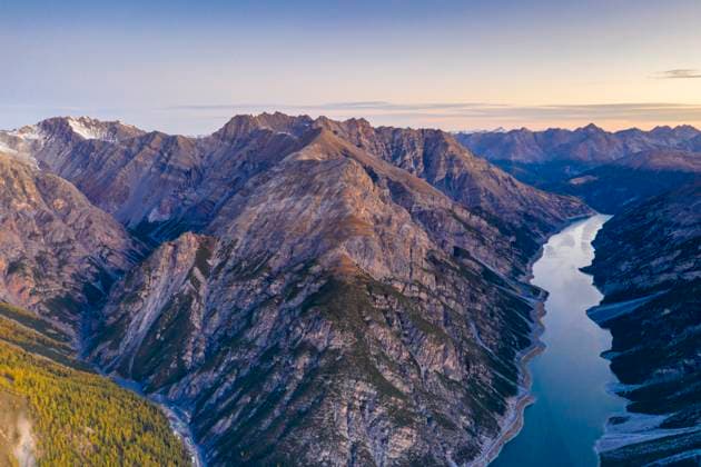 Aerial view of Livigno lake and mountains in autumn, Valtellina Livigno, Lombardy, Italy CR_ROMO240611-1454347-01