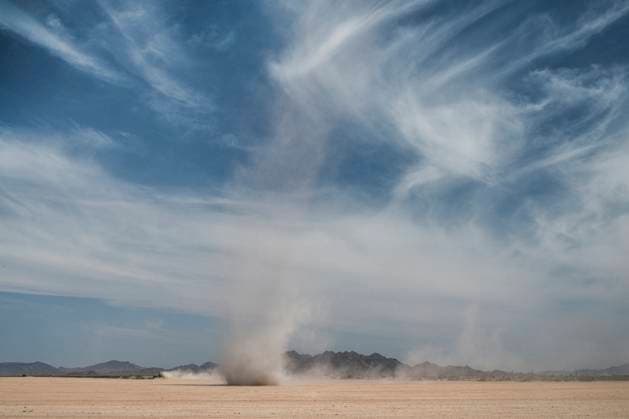Creative Highlights World Dust devil stirred up in deserted field Gila Bend, Arizona, United States R_MALI241013A-1557026-01
