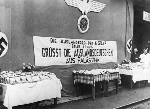 12 01 1942. Orig. caption... DEUTSCHE RÜCKWANDERER AUS PALÄSTINA Deutsche Rückwanderer aus Palästina wurden auf der Durchfahrt nach Deutschland in Belgrad und Semlin von der Auslandsorganisation der NSDAP betreut. Germany sp_sw x5600x *** 12 01 1942 Orig caption GERMAN RETURNERS FROM PALESTINE German returnees from Palestine were looked after in Belgrade and Semlin by the NSDAPs foreign organization on their way to Germany Germany sp sw x5600x  Copyright: xSVTx RETURNING GERMANS FROM PALESTINE