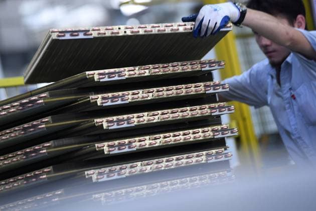 China Home Appliances Manufacturing A man works at a plant of air conditioners in Wuhan city in central China s Hubei province Wednesday, Oct. 16, 2024., Credit:SHEPHERD ZHOU Avalon CHINA, HUBEI, WUHAN  Copyright: xSHEPHERDxZHOUx xAvalonx 0922967660