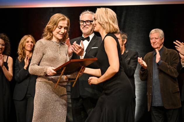16th Lumiere Film Festival Lumiere Award Ceremony Isabelle Huppert, Alfonso Cuaron, Noemie Merlant attending the Lumiere Award Ceremony ( Prix Lumiere ) during the 16th Lumiere Film Festival in Lyon, France on October 18, 2024. Photo by Julien Reynaud APS-Medias ABACAPRESS.COM Lyon France  Copyright: xReynaudxJulien APS-Medias ABACAx