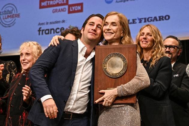 16th Lumiere Film Festival Lumiere Award Ceremony Isabelle Huppert and her son attending the Lumiere Award Ceremony ( Prix Lumiere ) during the 16th Lumiere Film Festival in Lyon, France on October 18, 2024. Photo by Julien Reynaud APS-Medias ABACAPRESS.COM Lyon France  Copyright: xReynaudxJulien APS-Medias ABACAx