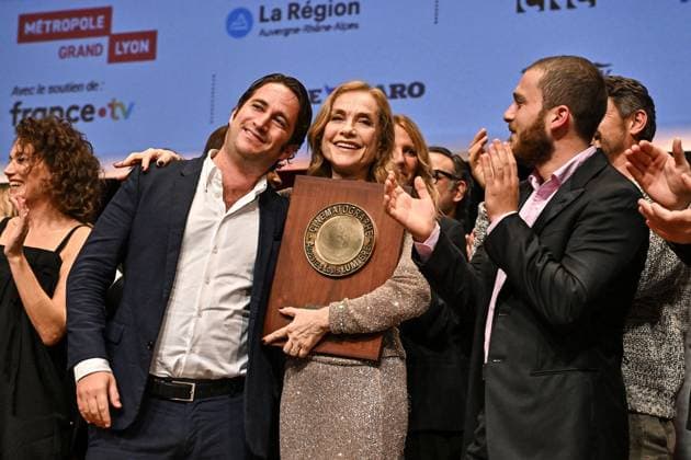16th Lumiere Film Festival Lumiere Award Ceremony Isabelle Huppert and her sons Angelo and Lorenzo attending the Lumiere Award Ceremony ( Prix Lumiere ) during the 16th Lumiere Film Festival in Lyon, France on October 18, 2024. Photo by Julien Reynaud APS-Medias ABACAPRESS.COM Lyon France  Copyright: xReynaudxJulien APS-Medias ABACAx