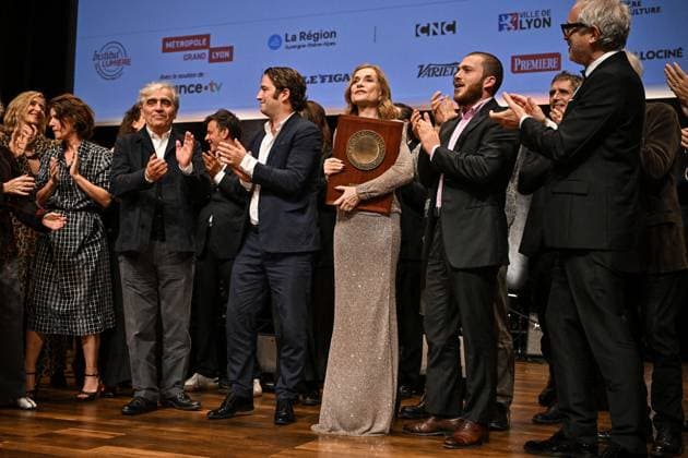 16th Lumiere Film Festival Lumiere Award Ceremony Isabelle Huppert, Ronald Chammah and their sons Angelo and Lorenzo attending the Lumiere Award Ceremony ( Prix Lumiere ) during the 16th Lumiere Film Festival in Lyon, France on October 18, 2024. Photo by Julien Reynaud APS-Medias ABACAPRESS.COM Lyon France  Copyright: xReynaudxJulien APS-Medias ABACAx