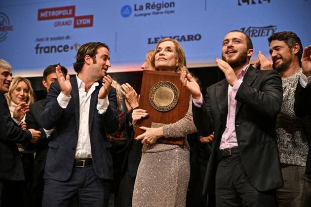 16th Lumiere Film Festival Lumiere Award Ceremony Isabelle Huppert and her sons Angelo and Lorenzo attending the Lumiere Award Ceremony ( Prix Lumiere ) during the 16th Lumiere Film Festival in Lyon, France on October 18, 2024. Photo by Julien Reynaud APS-Medias ABACAPRESS.COM Lyon France  Copyright: xReynaudxJulien APS-Medias ABACAx