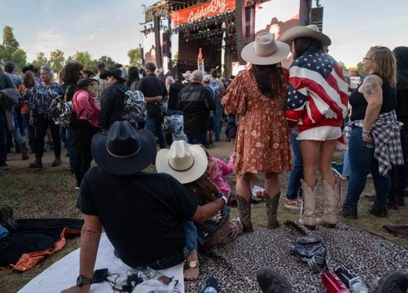 October 18, 2024, Sacramento, Ca, USA: John and Tammy Mosa, Brooke Toste and Lisa Stephenson of Arroyo Grande listen to Clint Black preform during the Golden Sky Music Festival at Discovery Park on Friday, Oct. 18, 2024 in Sacramento. Sacramento USA - ZUMAj89_ 20241018_zaf_j89_004 Copyright: xPaulxKitagakixJr.x