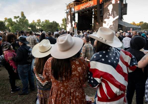 October 18, 2024, Sacramento, Ca, USA: Tammy Mosa, Brooke Toste and Lisa Stephenson of Arroyo Grande listen to Clint Black preform during the Golden Sky Music Festival at Discovery Park on Friday, Oct. 18, 2024 in Sacramento. Sacramento USA - ZUMAj89_ 20241018_zaf_j89_006 Copyright: xPaulxKitagakixJr.x