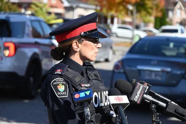 October 20, 2024, Markham, Canada: Constable Lisa Moskaluk answers questions from the media to provide an update on an ongoing homicide investigation in Markham. The York Regional Police Homicide Unit are seeking suspects after a man was fatally shot in his driveway in the City of Markham. Saturday evening, after approximately 6:30 p.m. police responded to the area of 14th Avenue and McCowan Road. When officers arrived on scene, they located a man who has been identified as 44-year-old Partheepan Panchalingam from Markham suffering from gunshot wounds in the driveway of his residence. The victim was pronounced dead at the scene. Investigators are looking for at least one suspect, wearing dark clothing, who was seen in the area at the time, - ZUMAs197 20241020_aaa_s197_277 Copyright: xKylexMazzax