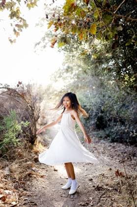 Creative Highlights Symbolfotos Seven Year Old Girl Spinning on Trail in San Diego San Diego, California, United States CR_JIDE241017-1565350-01 ,model released, Symbolfoto