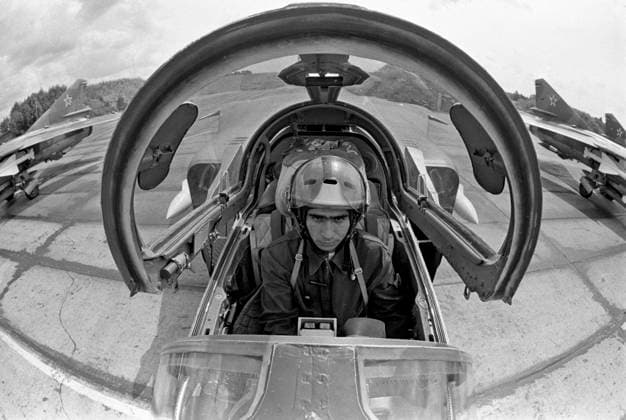 Soviet and Afghan fighter pilots in DRA 8771117 01.07.1985 Democratic Republic of Afghanistan. Soviet fighter pilots in Afghanistan. An Afghan pilot in the cockpit of a MIG-23 fighter before takeoff. Valery Sukhodolskiy Kabul  Copyright: xValeryxSukhodolskiyx