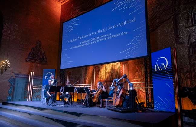 STOCKHOLM, SWEDEN 20241025 Stockholm Concert Orchestra and a cello playing robot, programmed by Fredrik Gran, perform a prelude written by Jacob Mürlrad during the Academy of Engineering Sciences IVA ceremony at the City Hall in Stockholm on Friday STOCKHOLM SWEDEN x10040x  Copyright: xAndersxWiklund TTx IVAS HÖGTIDSSAMMANKOMST 2024 HhZRRoaP_Ms
