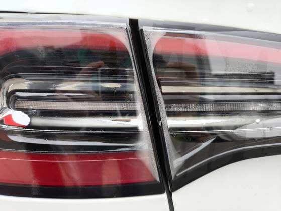 Bavaria, Germany - October 29, 2024: Rear lights of a car or passenger car full of condensation or condensation water in the headlights. Symbol for leaking lights or rear lights of an automobile. *** Rückleuchten eines Autos, bzw. PKW voller Kondensat, bzw. Kondenswasser in den Scheinwerfern. Symbol für undichte Lichter bzw. Rücklichter eines Automobiles.