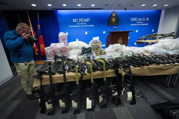 October 31, 2024, Surrey, Bc, CANADA: Firearms, illicit drugs and cash that were seized last week are displayed before a news conference at RCMP headquarters, in Surrey, B.C., on Thursday, October 31, 2024. The RCMP says they have dismantled the largest and most sophisticated fentanyl and methamphetamine drug superlab in Canada, after an operation was conducted in Falkland, B.C., and Surrey beginning last Friday. Surrey CANADA - ZUMAc35_ 20241031_zaf_c35_105 Copyright: xDarrylxDyckx