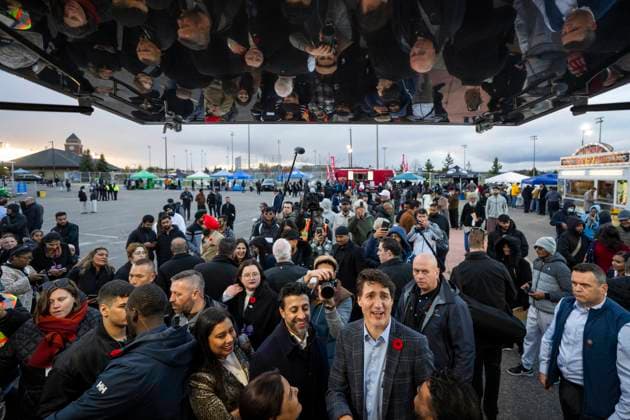 November 1, 2024, Brampton, On, CANADA: Prime Minister Justin Trudeau meets with Surinder and Iqbal Nahar, bottom middle, of Passion Profession Kitchen as he tours various vendors at the Diwali Mela festival at Sesquicentennial Park in Brampton, Ont., Friday, Nov. 1, 2024. Brampton CANADA  - ZUMAc35_ 20241101_zaf_c35_070 Copyright: xAndrewxLahodynskyjx