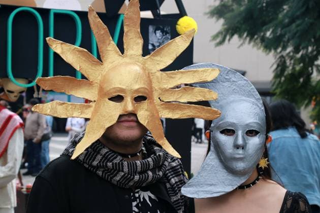 UNAM Mega Offering Day Of The Dead 2024 A couple wearing Sun and Moon masks is seen during the Twenty-seventh Edition of the University Day of the Dead Festival Mega Ofrenda UNAM 2024, Mexico seen through the lens, on the esplanade and parking lot of UNIVERSUM, Museum of Sciences of the National Autonomous University of Mexico (UNAM) south of Mexico City, Mexico, on November 1, 2024. This year, this Mega Ofrenda is dedicated to Mexican cinema and can be visited from November 1 to 3, 2024. MÃ xico City Mexico  Copyright: xJosexLuisxToralesx originalFilename: torales-notitle241101_npZY8.jpg