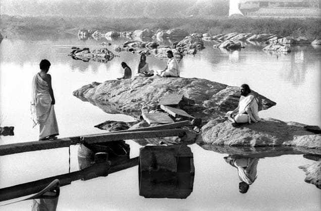 Hindu priest seating on rocks, India Copyright: xTxSatyan DinodiaxPhotox