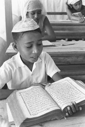 Pupil in classroom ; Male capital of Maldives NO MR Copyright: xTxSatyan DinodiaxPhotox