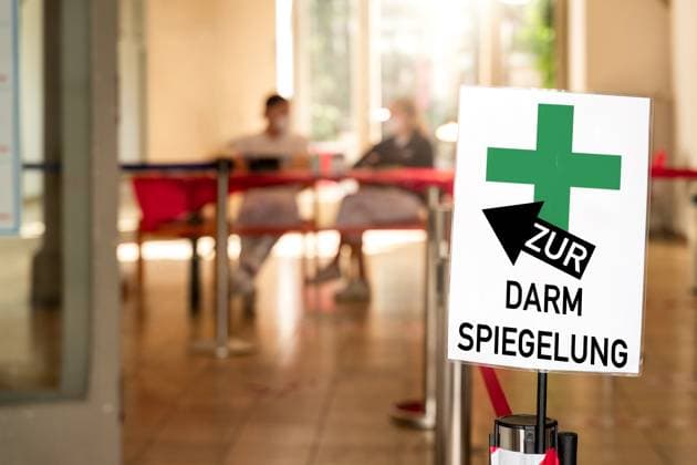 Germany - June 20, 2024: For a colonoscopy! It says on a sign in a doctor s surgery, or in a gastroenterology practice. You can see medical assistants. Symbolizes the performance of a colonoscopy to detect and remove any polyps that may be present, which can be precursors of colon cancer. PHOTOMONTAGE *** Zur Darmspiegelung! Steht auf einem Schild, einer Arztpraxis, bzw. in einer Praxis für Gastroenterologie. Zu sehen sind medizinische Fachangestellte. Symbolisiert Durchführung einer Koloskopie, um eventuell vorhandene Polypen zu entdecken und zu entfernen, welche Vorstufen von Darmkrebs sein können. FOTOMONTAGE