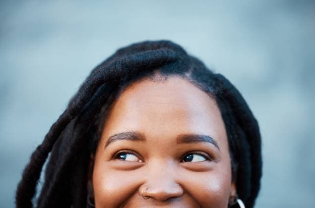 Creative Highlights Symbolfotos Vision, idea and portrait of eyes of woman looking, thinking and a smile on face. Cropped headshot of happy black woman smiling with creative ideas. Mockup for wonder, student and mind of youth. model released property released Copyright: xwww.peopleimages.comx