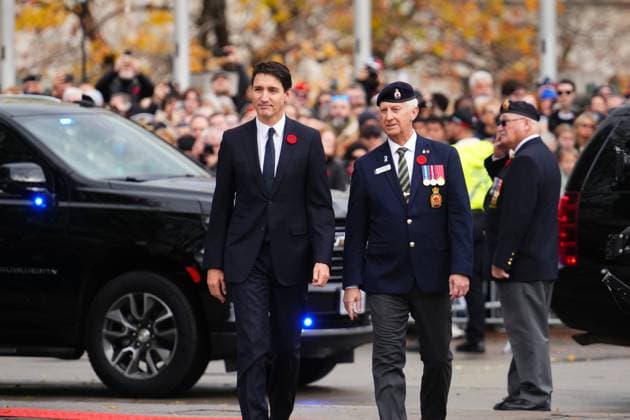 November 11, 2024, Ottawa, On, CAN: Prime Minister Justin Trudeau and Steven Clark, national executive director of the Royal Canadian Legion, arrive at a Remembrance Day ceremony at the National War Memorial in Ottawa on Monday, Nov. 11, 2024. Ottawa CAN  - ZUMAc35_ 20241111_zaf_c35_010 Copyright: xSeanxKilpatrickx